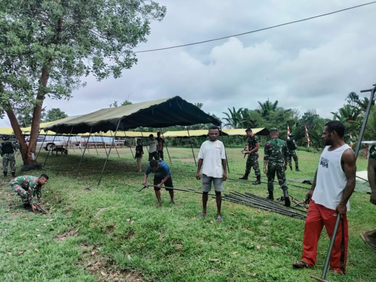 Satgas Pamtas Yonif 126/KC Atasi Kesulitan Warga Saat Persiapan Acara Petabisan di Gereja 
